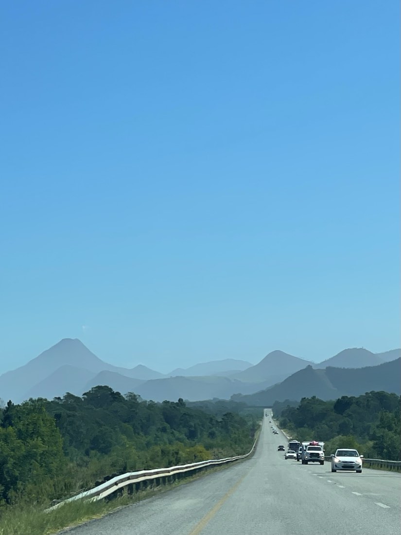 The open road heading west toward the Outeniqua mountains on the Garden Route.